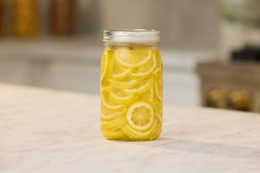 Ball Regular Mouth Glass Mason Jars with Lids and Bands, Used for Canning (Quart, 32 Ounce (Pack of 4)) - Image 3