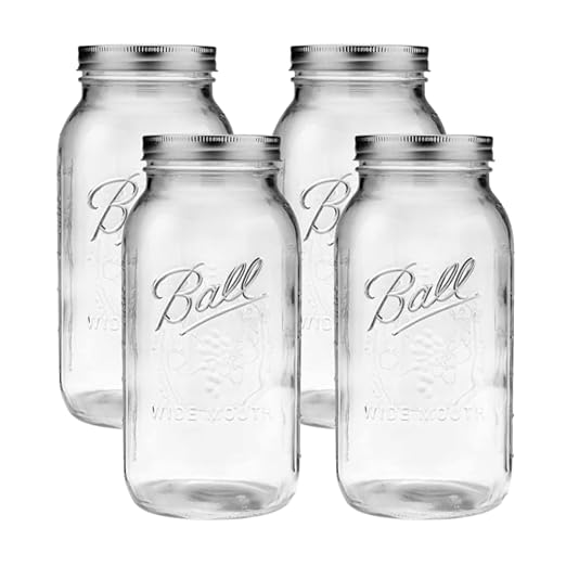 Ball Wide Mouth Glass Mason Jars with Lids and Bands, Used for Canning, Pickling, Juice, Jam, Jelly, Half Gallon Size 64 Ounce (Pack of 4) by BallJar