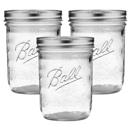 Ball Wide Mouth Glass Mason Jars with Lids and Bands, Used for Canning, Pickling, Juice, Jam, Jelly, Pint Size 16 Ounce (Pack of 3) by BallJar