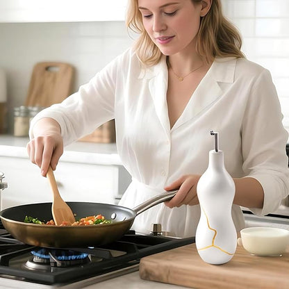 BosilunLife Ceramic Olive Oil Dispenser Bottle, 22 Oz Oil Cruet with Elegant Gold Accent & Curved Ergonomic Design, Non‑Drip Vinegar Bottle for Kitchen & Dining, White