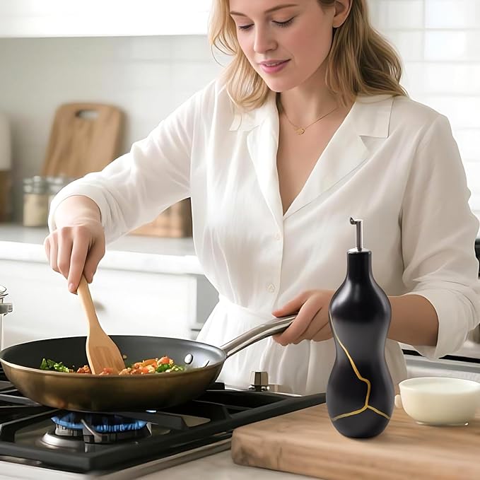 BosilunLife Ceramic Olive Oil Dispenser Bottle, 14 Oz Oil Cruet with Elegant Gold Accent & Curved Ergonomic Design, Non‑Drip Vinegar Bottle for Kitchen & Dining, Black