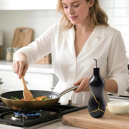 BosilunLife Ceramic Olive Oil Dispenser Bottle, 14 Oz Oil Cruet with Elegant Gold Accent & Curved Ergonomic Design, Non‑Drip Vinegar Bottle for Kitchen & Dining, Black