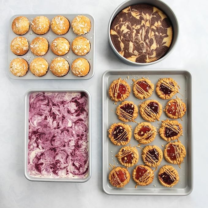 Nordic Ware Brilliant™ Colorful 4-Pc Baking Set, Nonstick made without PFAS or PTFE for safe cooking; Reinforced steel rim prevents warping; Half Sheet, 9x13 Inch Pan, 9-Inch Round Pan and Muffin Pan - Image 2