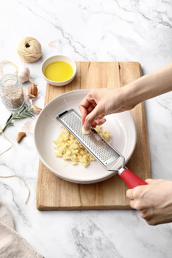 Spring Chef Stainless Steel Lemon Zester Grater with Handle - Garlic, Cheese, Parmesan, Nutmeg, Lime, Ginger Grater - Heavy Duty Kitchen Tool - Citrus Zester with Blade Cover - Fine Shred - Red