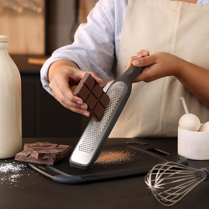 Zyliss Rasp Grater - Handheld Grater with Stainless Steel Blade & Wheat Straw Handle - Ideal for Hard Cheese, Chocolate, Ginger, & More - Protective Cover Doubles as Scraper