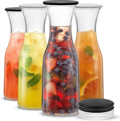 JoyJolt Glass Carafe with Lid, Set of 4 – 1 Liter Glass Pitcher for Mimosa Bar, Water, Iced Tea, Juice, Wine, Lemonade, Milk – Dishwasher Safe Beverage Drink Dispensers for Brunch, Parties by JoyJolt