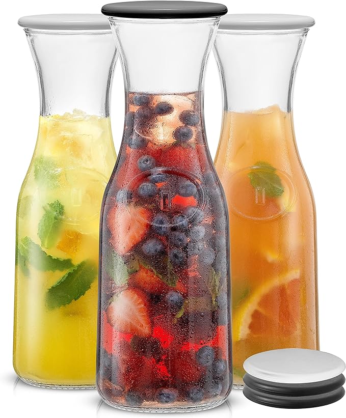 JoyJolt Glass Carafe with Lid, Set of 3 – 1 Liter Glass Pitcher for Mimosa Bar, Water, Iced Tea, Juice, Wine, Lemonade, Milk – Dishwasher Safe Beverage Drink Dispensers for Brunch, Parties by JoyJolt