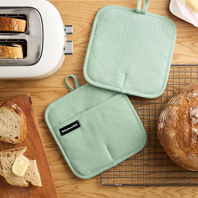 KITCHENAID Gourmet Series Gridlines Pot Holders 2-Pack Set, Heat Resistant up to 600°F, Soft Silicone Grip, Magnetic Cuff, Pistachio Green, 8"x8" - Image 2